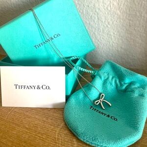 Tiffany & Co. Silver Bow Necklace with original pouch and box